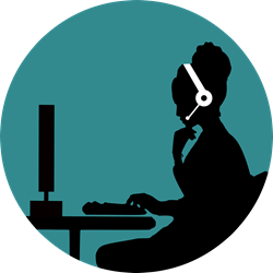 image of a desktop support professional wearing a headset at computer